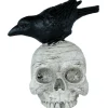 CORBEAU PERCHÉ SUR CRÂNE DÉCO RÉSINE 14X9CM